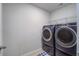 Laundry room featuring a side-by-side washer and dryer, and wire shelving at 1059 Sago Palm Ct, Mount Pleasant, SC 29429