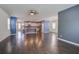Open-concept floor plan with hardwood floors connecting kitchen and living room with modern finishes at 1059 Sago Palm Ct, Mount Pleasant, SC 29429
