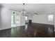 Spacious living room with hardwood floors, fireplace, and natural light at 1059 Sago Palm Ct, Mount Pleasant, SC 29429