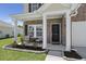Cozy front porch with seating, perfect for relaxing and enjoying the neighborhood views at 110 Levis Song Ct, Goose Creek, SC 29445