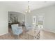 Bright living room with patio access, light wood floors, and neutral tones at 110 Levis Song Ct, Goose Creek, SC 29445