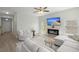 Cozy living room with a fireplace, comfortable seating, and a bright, airy ambiance at 110 Levis Song Ct, Goose Creek, SC 29445