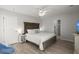 Spacious bedroom with neutral decor, ceiling fan, and ample natural light at 110 Levis Song Ct, Goose Creek, SC 29445