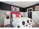 Stylish bedroom with a unique color scheme, decorative artwork, and comfortable bedding at 113 Crosscut Ln, Summerville, SC 29486