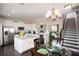 Modern kitchen featuring white cabinets, stainless steel appliances, and a center island with seating at 113 Crosscut Ln, Summerville, SC 29486