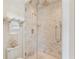 Elegant bathroom features a frameless glass shower, marble tile, and rain shower head at 12 Orange St, Charleston, SC 29401
