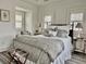 Comfortable bedroom featuring neutral tones, natural light and soft furnishings at 12 Orange St, Charleston, SC 29401