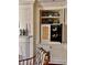 Elegant built-in features decorative plates and a convenient beverage refrigerator at 12 Orange St, Charleston, SC 29401