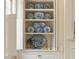 Custom built-in display case featuring blue and white china at 12 Orange St, Charleston, SC 29401