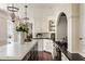Gourmet kitchen with custom white cabinets, marble countertops, and chef-grade appliances at 12 Orange St, Charleston, SC 29401