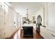 Spacious kitchen with center island, custom cabinetry, and chef-grade appliances at 12 Orange St, Charleston, SC 29401