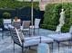 Charming outdoor patio area with elegant furniture and lush greenery at 12 Orange St, Charleston, SC 29401