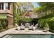 Lush outdoor area with a swimming pool and elegant patio furniture at 12 Orange St, Charleston, SC 29401