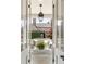 Inviting porch with classic furnishings offers a serene outdoor living space at 12 Orange St, Charleston, SC 29401