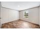 Bright bedroom features wood-look flooring and a window offering natural light at 120 Perry Hill Rd, Moncks Corner, SC 29461