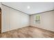 Cozy bedroom featuring wood floors, a large window, and neutral wall paint at 120 Perry Hill Rd, Moncks Corner, SC 29461