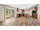 Open kitchen and dining area with modern appliances and sliding door access to the back deck at 120 Perry Hill Rd, Moncks Corner, SC 29461