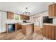 Well-appointed kitchen featuring wood cabinetry, stone countertops, and an island at 120 Perry Hill Rd, Moncks Corner, SC 29461