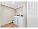 A well-lit laundry room with a modern washer and dryer at 120 Perry Hill Rd, Moncks Corner, SC 29461