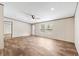 Spacious living room with bright natural light, ceiling fan, and neutral wall color at 120 Perry Hill Rd, Moncks Corner, SC 29461