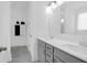 Bright bathroom with double sink vanity, gray cabinets, white countertops, and modern fixtures at 1238 Homecoming Blvd Blvd, Ravenel, SC 29470