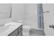 Bathroom with shower, vanity, and toilet, featuring a stylish shower curtain at 1238 Homecoming Blvd Blvd, Ravenel, SC 29470