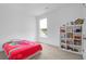 Bright bedroom featuring a playful decor with a cozy bed and a stylish storage shelf at 1238 Homecoming Blvd Blvd, Ravenel, SC 29470