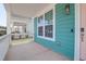 Inviting front porch with views of the neighborhood and space for seating at 1238 Homecoming Blvd Blvd, Ravenel, SC 29470