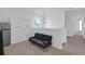 Comfortable loft area featuring a sleeper sofa, min-fridge, and a view of neighborhood at 1238 Homecoming Blvd Blvd, Ravenel, SC 29470