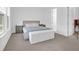 Bright and airy main bedroom with modern furniture, neutral tones, and an inviting atmosphere at 1238 Homecoming Blvd Blvd, Ravenel, SC 29470