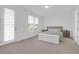 Well-lit main bedroom featuring a comfortable bed, stylish nightstands, and serene ambiance at 1238 Homecoming Blvd Blvd, Ravenel, SC 29470