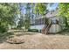 This property boasts a spacious backyard with mature trees at 1325 Moss Path, Mount Pleasant, SC 29464