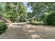 Enjoy the serene backyard that borders a tranquil pond at 1325 Moss Path, Mount Pleasant, SC 29464