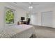 Bright bedroom featuring carpet, ceiling fan, and double closets at 1325 Moss Path, Mount Pleasant, SC 29464