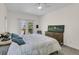 Bedroom with ceiling fan, private deck with water views, and contemporary wooden dresser at 1325 Moss Path, Mount Pleasant, SC 29464