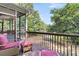Back deck overlooking water with chairs and lake views at 1325 Moss Path, Mount Pleasant, SC 29464