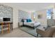 Comfortable bedroom featuring a queen bed, a desk, and stylish decor, making it a relaxing space at 14 Lockwood Dr # 1C, Charleston, SC 29401