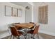 Dining room with a wooden table and four stylish chairs at 14 Lockwood Dr # 1C, Charleston, SC 29401
