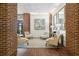 Inviting lobby area with comfortable seating, brick accents, and elegant decor at 14 Lockwood Dr # 1C, Charleston, SC 29401