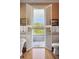 Balcony overlooking lush greenery provides an inviting outdoor living space at 15 Rutledge Ave, Charleston, SC 29401