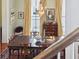 Dining room with chandelier, window with natural light, and traditional furnishings at 15 Rutledge Ave, Charleston, SC 29401