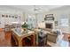 Open-concept living room with fireplace, hardwood floors, and ample seating at 15 Rutledge Ave, Charleston, SC 29401