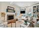 Inviting living room with a brick fireplace, custom built-ins, and comfortable seating arrangement at 15 Rutledge Ave, Charleston, SC 29401