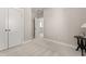 Neutral bedroom showcasing closet doors, a table with a lamp, and carpeted floors at 150 Midtown Ave, Summerville, SC 29486