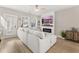 Stylish living room featuring a fireplace, modern furnishings, and ample natural light at 150 Midtown Ave, Summerville, SC 29486