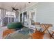 Inviting screened-in patio with an inflatable hot tub and a hammock for relaxing outdoors at 150 Midtown Ave, Summerville, SC 29486