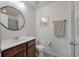 Well-lit bathroom features a modern vanity and toilet at 1589 Bluewater Way, Charleston, SC 29414