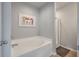 Clean bathroom with a soaking tub and a separate glass-enclosed shower at 1589 Bluewater Way, Charleston, SC 29414