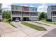 Three-story townhome offers attached garages and private screened porches for relaxed outdoor living at 1589 Bluewater Way, Charleston, SC 29414