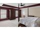 Expansive bedroom features a decorative wardrobe, windows, and a four-poster bed at 167 Decatur Dr, Summerville, SC 29486
